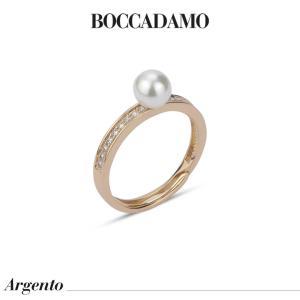 Anillo bañado en oro amarillo con circonitas y perla