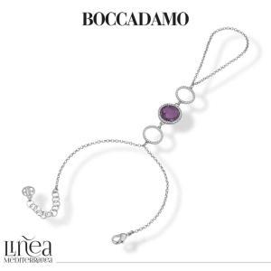 Pulsera de cadena con anillo, cristal amatista y decoración central.