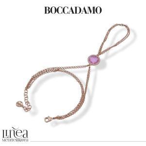Pulsera de cadena doble con anillo y cristal rosa.